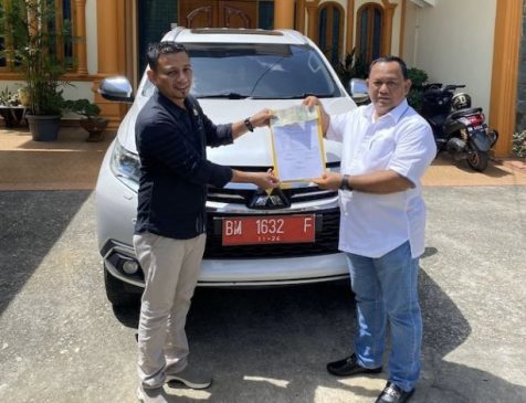 Mundur dari ASN, Bakal Calon Bupati Kampar Yusri Kembalikan Mobil Dinas