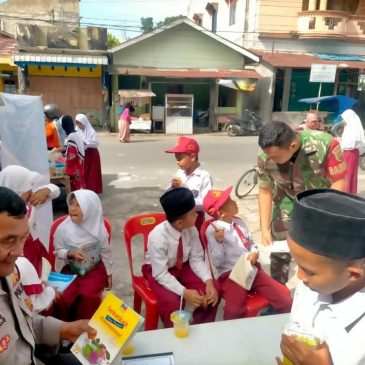 Babinsa dan Bhabinkamtibmas Sosialisasikan Kedisiplinan di SD Nurul Falah