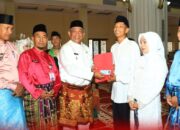 Bupati Anton Nikahkan 20 Pasangan di Rohul: “Menyatukan Cinta Dalam Ridho Ilahi”