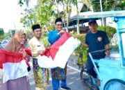 Perkuat Nasionalisme, Ribuan Bendera Merah Putih Dibagikan ke Warga Bengkalis Sesuai Instruksi Bupati