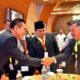 Bupati Kerinci Hadiri Acara Pembangunan Meritokrasi Instansi Daerah di Palembang. | Foto: Ist