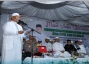 Cahaya Obor di Bawah Hujan, Warga Rohul Rayakan Takbiran Penuh Sukacita