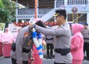 Prosesi Pedang Pora dan Tepung Tawar Sambut Kapolres Baru Inhu AKBP Eka Ariandy